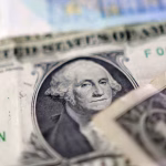 U.S. dollar banknotes are seen in this illustration taken May 4, 2025. REUTERS/Dado Ruvic/Illustration